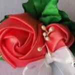 broche de papel para cabello con forma de rosa