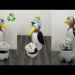 pinguinos hechos con botellas de plastico reciclado